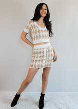 Load image into Gallery viewer, Looking preppy in your Argyle!  This fabulous Argyle sweater set features a short sleeve V-neck crop top and a high waist skirt with button front detail. 
