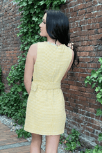 Load image into Gallery viewer, Chase your dreams and show up in class wearing this gorgeous dress! Features an eyelash V neck and a pearl-embellished buckle and buttons on the faux pockets. This luxurious dress is a beautiful yellow and white woven fabric and it&#39;s lined for added comfort.  100% woven polyester Available in sizes Small, Medium, and Large Lined Zip up 
