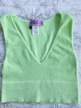 Load image into Gallery viewer, Take the plunge with this sleeveless V neck crop top. This figure-hugging top is made from a ribbed seamless fabric and features a V-shaped neckline with a cropped fit. Pair it with some sweat pants for comfort or dress it up with some jewelry and jeans! One Size.  Available in 4 Colors.  92%Nylon 8% Spandex Sleeveless V Neck Available in Blue, Brown, Yellow, and Lime
