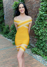 Load image into Gallery viewer, What a class act! Go out looking like a bombshell in this gorgeous and classy bright yellow bandage-style body-con mini dress with Greek Key design. Paired with gorgeous jewelry and fashion pumps, they will notice you arriving with class. Available in sizes small, medium and large.
